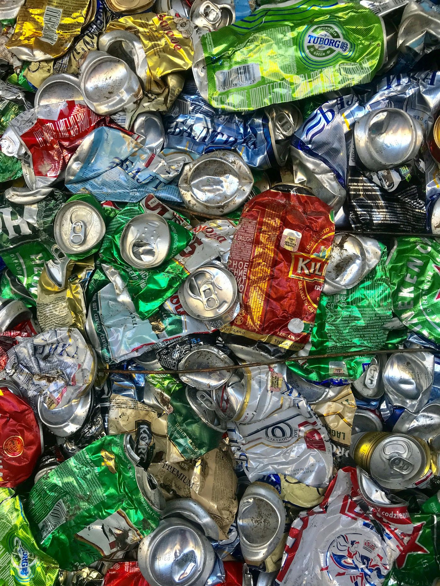 Workers sorting materials at a recycling facility